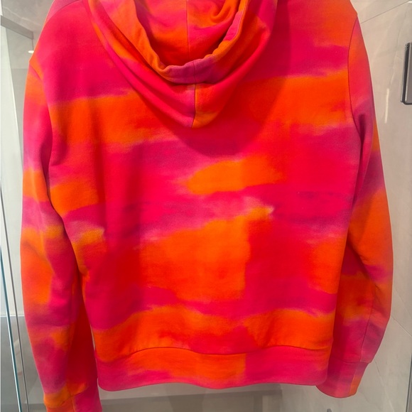 Versace sweater. Orange and pink. It’s like a woman small. - Picture 3 of 5